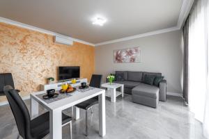TV a/nebo společenská místnost v ubytování Apartments MaKris No1