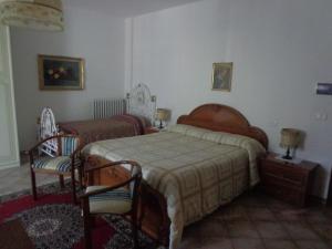 Postel nebo postele na pokoji v ubytování Agriturismo San Giuseppe