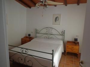 Postel nebo postele na pokoji v ubytování Agriturismo San Giuseppe