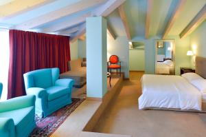 Llit o llits en una habitació de Villa Miravalle