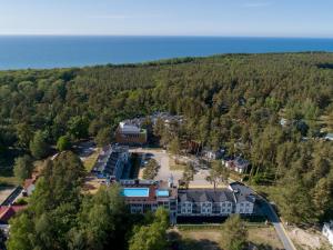 an aerial view of the resort with the ocean in the background at Apartament 21B Blue Marine Poddąbie in Poddąbie