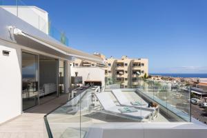 a balcony with a view of the ocean at Deluxe Apartment in Costa Adeje in Adeje