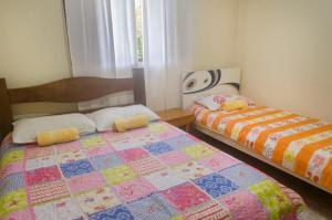 Cama o camas de una habitación en Hostel Recanto da Serra