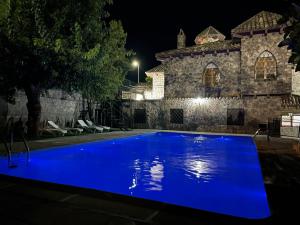 The swimming pool at or close to Casa Rural La Moraleja