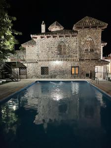 The swimming pool at or close to Casa Rural La Moraleja