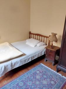 Postel nebo postele na pokoji v ubytování Triomphe Hostel