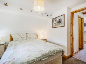 Ένα ή περισσότερα κρεβάτια σε δωμάτιο στο Glan Nug Bach