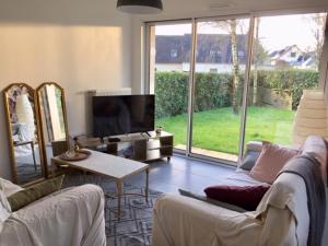 Posedenie v ubytovaní maison de charme avec jardin,pacé,proche de Rennes