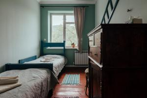 Uma cama ou camas num quarto em Chamich Guesthouse
