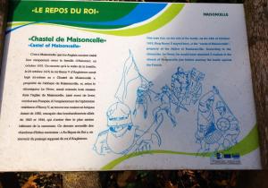 a sign with drawings of knights on it at Au repos du roi in Maisoncelle