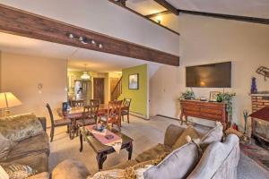 a living room with a couch and a table at Ian's Camelback House in Tannersville