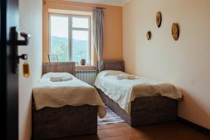 Uma cama ou camas num quarto em Chamich Guesthouse