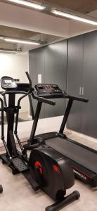 a gym with a treadmill in a room at KaKtus Palermo Soho in Buenos Aires