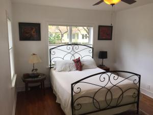 a bedroom with a white bed with a window at 1620 - 5-Room Apt. with Pool & Gardens , Near Downtown in St Petersburg