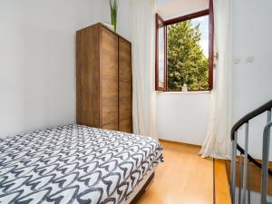 Posteľ alebo postele v izbe v ubytovaní Studioapartman BB5, Rijeka