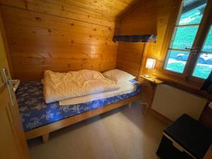 Letto o letti in una camera di Chalet Singlinaz