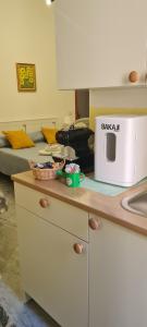 A kitchen or kitchenette at le ginestre in centro