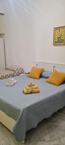 A bed or beds in a room at le ginestre in centro