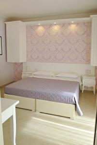 A bed or beds in a room at B&B Brindesi