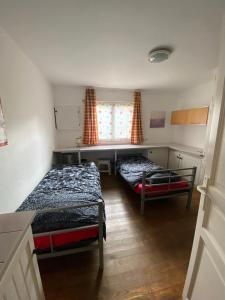 Posteľ alebo postele v izbe v ubytovaní Maison située au Val de Baubère, petite vallée à coté du village de Seix