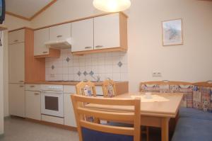 Kuchyň nebo kuchyňský kout v ubytování Ferienwohnung Hofer + 8 fotografií