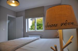 Postel nebo postele na pokoji v ubytování Petit coin de paradis