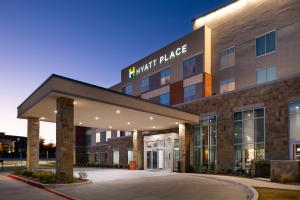 a large building with a sign that reads knight place at Hyatt Place Dallas/Rockwall in Rockwall