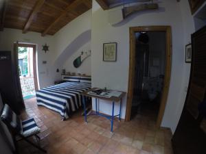 Postel nebo postele na pokoji v ubytování Villa La Zagara