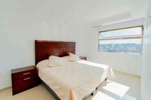 Postel nebo postele na pokoji v ubytování Terra Residencial