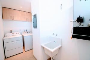 Kuchyň nebo kuchyňský kout v ubytování Terra Residencial
