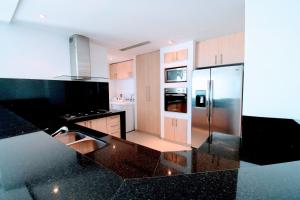 Kuchyň nebo kuchyňský kout v ubytování Terra Residencial