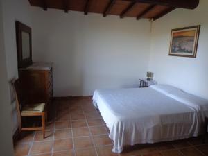 Postel nebo postele na pokoji v ubytování Agriturismo San Giuseppe