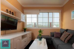 Telewizja i/lub zestaw kina domowego w obiekcie Inma Apartment Montaña La Data