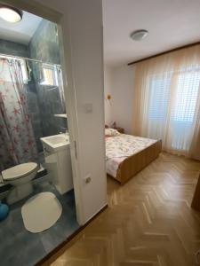 Koupelna v ubytování Apartments with a parking space Kampor, Rab - 12273