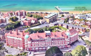 an aerial view of a resort on the beach at Sea View Family Stay by Beach Gym & Parking in Bournemouth