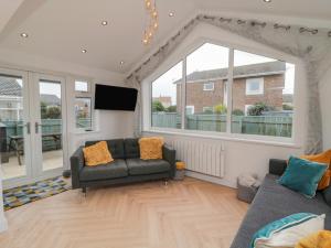 Et opholdsområde på Sunrise Cottage