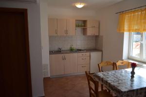 Fotografia z galérie ubytovania Apartments with a parking space Lun, Pag - 13022 v destinácii Lun