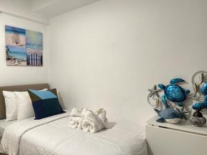 Ένα ή περισσότερα κρεβάτια σε δωμάτιο στο Arabic-Mediterranean 2BR at Azure Maldives Tower