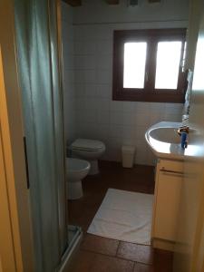 Łazienka w obiekcie Villa Pastori