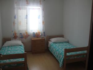 Fotografie z fotogalerie ubytování Apartments by the sea Grebastica, Sibenik - 13406 v destinaci Bašelovići