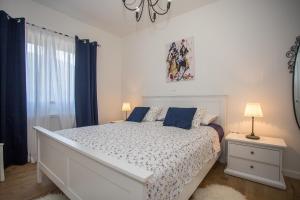 Posteľ alebo postele v izbe v ubytovaní Seaside holiday house Mali Ston (Peljesac) - 13443