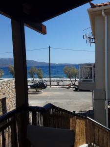 a view of the ocean from the balcony of a house at Blu Casa Del Mare in Monemvasia