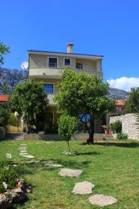 En have udenfor Apartments with parking space Orebic, Peljesac - 10097