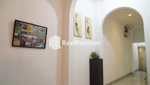 Foto sihtkohas Medan asuva majutusasutuse Wisma Sederhana Medan Mitra RedDoorz galeriist
