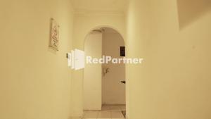 Foto sihtkohas Medan asuva majutusasutuse Wisma Sederhana Medan Mitra RedDoorz galeriist