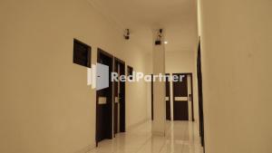 Foto sihtkohas Medan asuva majutusasutuse Wisma Sederhana Medan Mitra RedDoorz galeriist