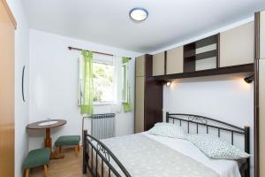 Fotografia z galérie ubytovania Apartments by the sea Brela, Makarska - 13620 v destinácii Brela