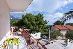 Fotografia z galérie ubytovania Apartments by the sea Brela, Makarska - 13620 v destinácii Brela