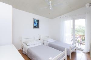 Fotografia z galérie ubytovania Apartments by the sea Brela, Makarska - 13620 v destinácii Brela