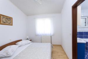 Fotografia z galérie ubytovania Apartments by the sea Brela, Makarska - 13620 v destinácii Brela
